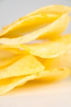 Potato chips on a white background Stock Photos