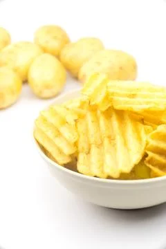 Potato chips on white background.. Stock Photos