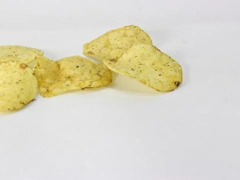 Potato chips on white background Stock Photos