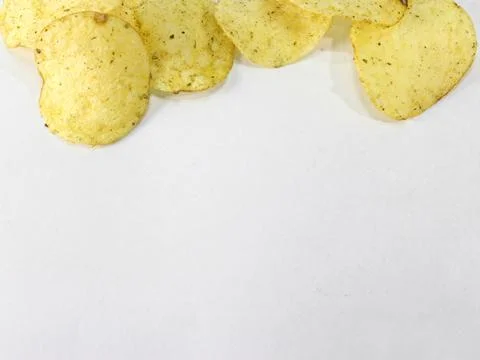 Potato chips on white background Stock Photos