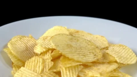 Potato chips in a white dish Stock Footage 258067152