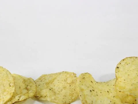 Potato chips on white Stock Photos