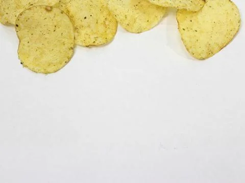 Potato chips on white Stock Photos