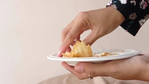 Potato chips on a white plate Stock Footage 146251538