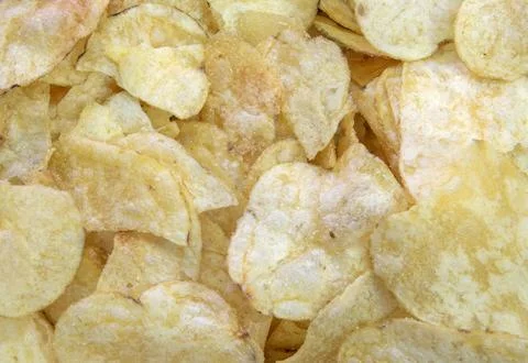 Potato chips/crisps background Stock Photos