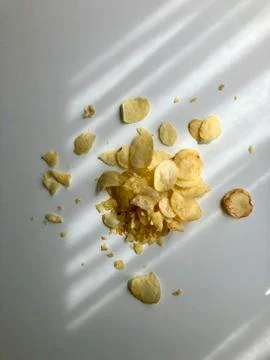 Potato chips/snacks on white background with shadow Stock Photos