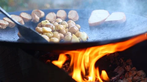 The potato is cooked on the grill. Stock Footage 118457213