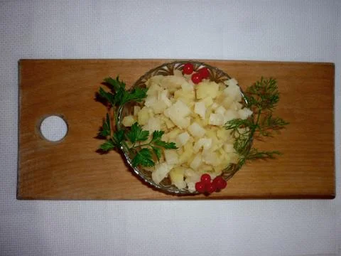 Potato cubes on a plate Stock Photos