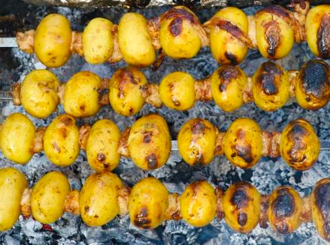 The potato is fried at the stake Stock Photos