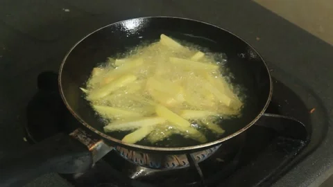 Potato frying process Stock Footage 207452626