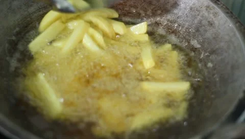 Potato frying process Stock Footage 222989347