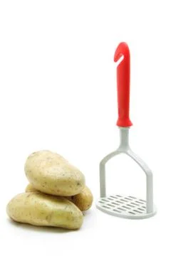 Potato with masher Stock Photos