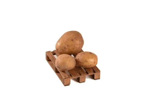 Potato on pallets on an isolated background Stock Photos