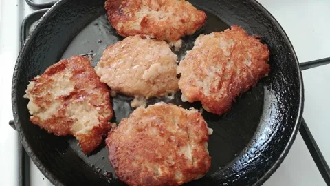 Potato pancakes. The process of cooking potato pancakes Stock Footage 288629281