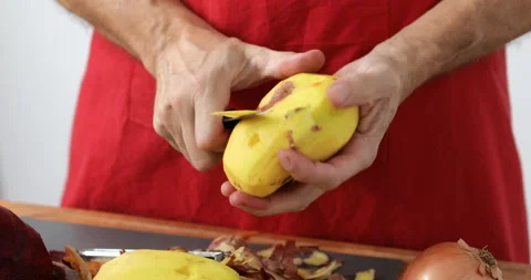 Potato peeled using peeling knife Stock Footage 147510996