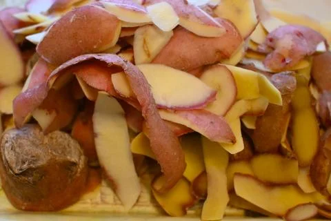 Potato peels in compost Stock Photos