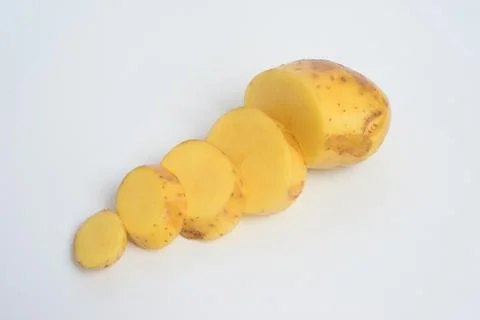 The potato is a root vegetable native to the Americas Stock Photos