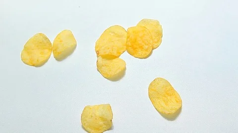 Potato salt chips white background hd footage nobody Stock Footage 109915967