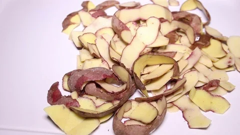 Potato Shells on White Background Stock Footage 73422916