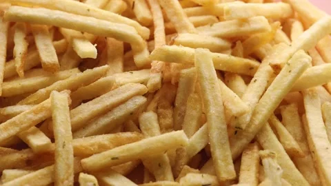 Potato straws close up, rotation in circle. potato background Stock Footage 235911314