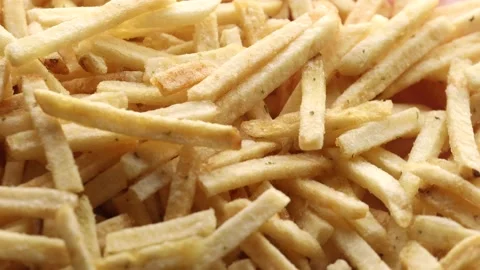 Potato straws close up, rotation in circle. potato background Macro Stock Footage 237233873