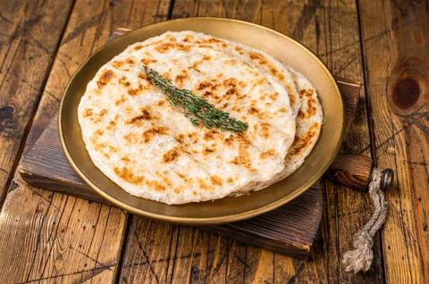 Potato Stuffed Flat Bread Aloo paratha, Traditional Indian food. wooden bac.. Stock Photos