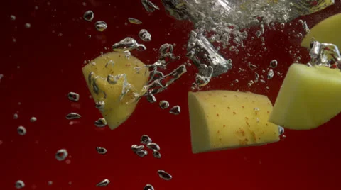 Potato in water, Slow Motion Stock Footage 31819608