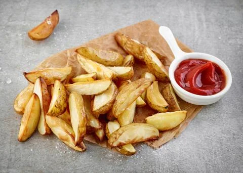 Potato wedges Stock Photos