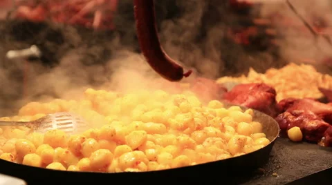 Potato which is fried on a big frying pan Stock Footage 47407697