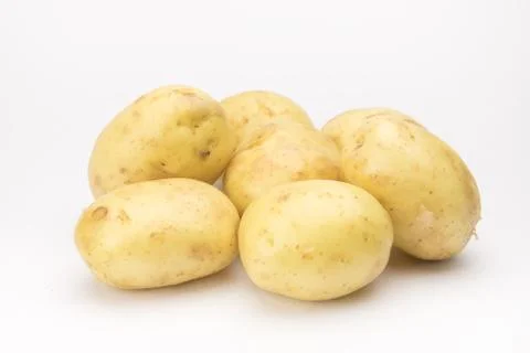 Potato on the white background Stock Photos
