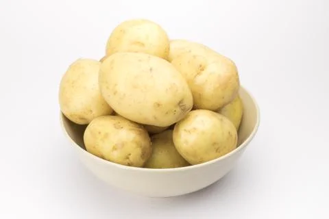 Potato on the white background Stock Photos