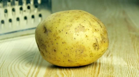 Potatoe on a table Stock Footage 68375081