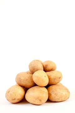 Potatoes against a white background. Stock Photos