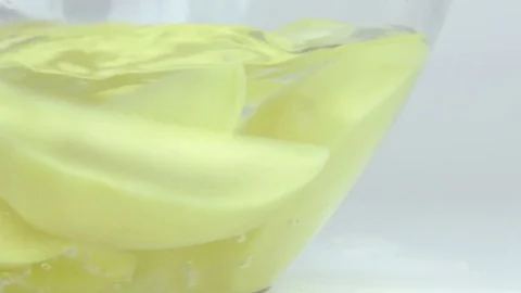 Potatoes are Boiling in a transparent container 動画素材 82844892