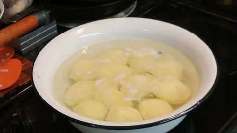 The potatoes are cooked, fast forward. The process of boiling potatoes. Stock Footage 82346227