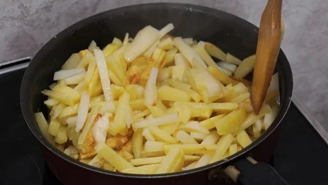 Potatoes are fried in a frying pan. Stock Footage 103281185