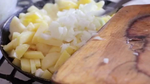 Potatoes are fried in a pan Stock Footage 249174198