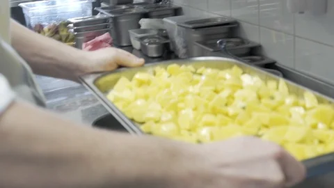 The potatoes are on the tray Stock Footage 114211289