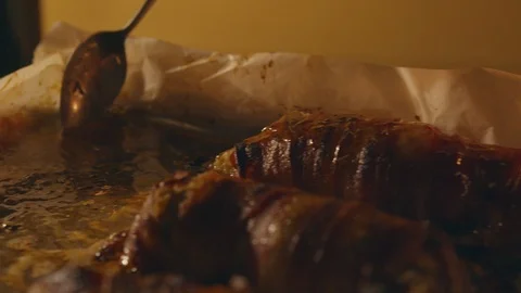 Potatoes in bacon from the oven Stock Footage 117940907