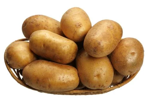 Potatoes in a basket, isolated Stock Photos