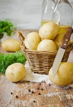 Potatoes in the basket Stock Photos