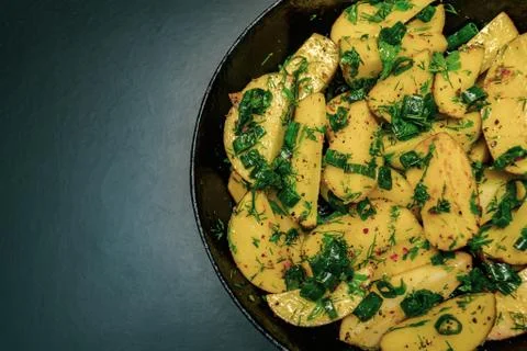 Potatoes on a black background Foto stock