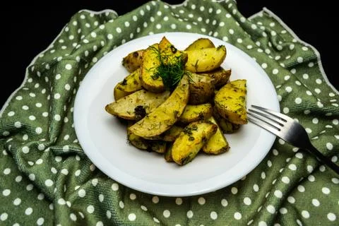 Potatoes on a black background Foto stock