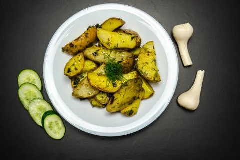 Potatoes on a black background Foto stock