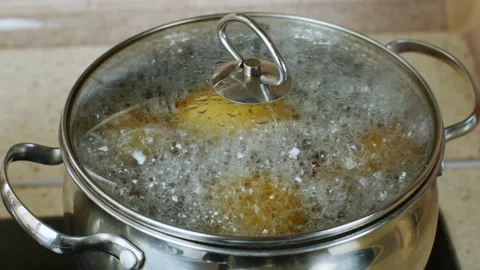 Potatoes boiled in boiling water in an iron pan. Potatoes are boiled in a pot on Stock Footage 234848740
