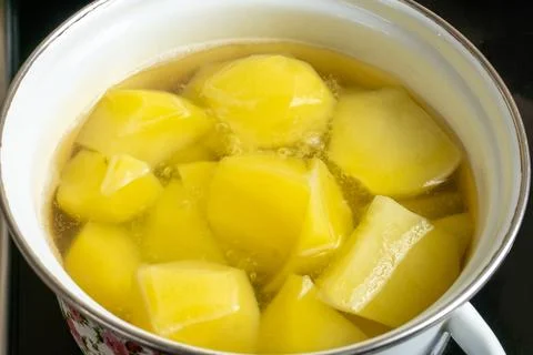 Potatoes Boiling in a Pot 写真素材