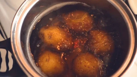 Potatoes in boiling water Stock Footage 76121183