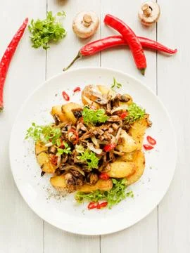 Potatoes with champignons Stock Photos