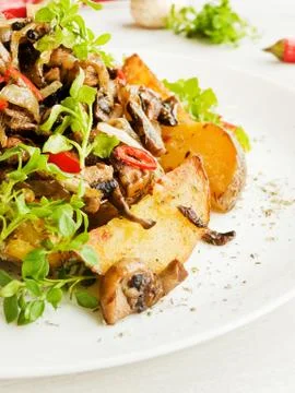 Potatoes with champignons Stock Photos