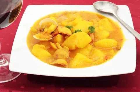 Potatoes with clams Stock Photos